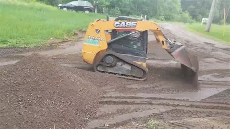 finish grading with skid steer|grading driveway with skid steer.